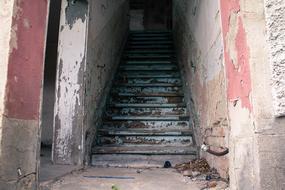 old staircase in an abandoned factory building