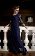 girl posing in blue evening dress