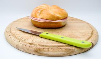 sliced sandwich on a board