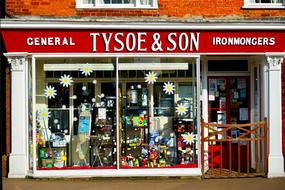 Colorful "Tysoe and Son" shop with signs