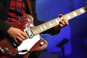 Guitar Electric Instrument and hand