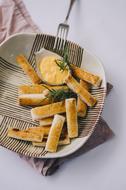 fried sticks with cheese sauce