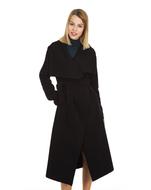 photo of a blonde in a black coat