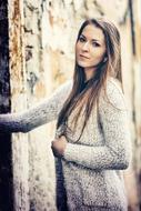photo of a girl at the entrance to the old building
