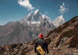 man on Mountain Peaks Landscape