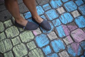 shoes on the colorful pavement