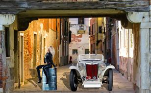 Young Woman and Sports Car