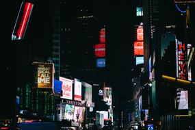 night lights and signage in the metropolis