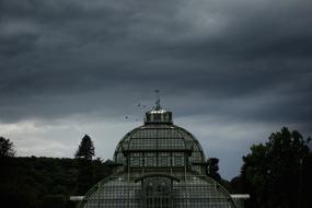the large dome of the building against the gray sky