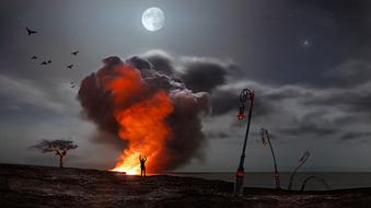 a burning fire against a gray sky