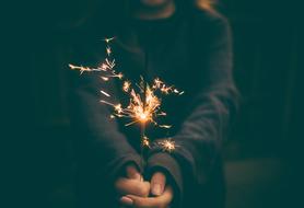 Guy sparklers fireworks hand