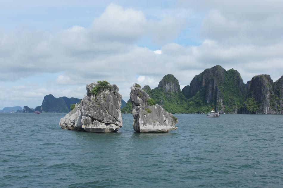 Beautiful landscape with the rocks and mountains at Halongbay in Vietnam, under the blue sky with clouds