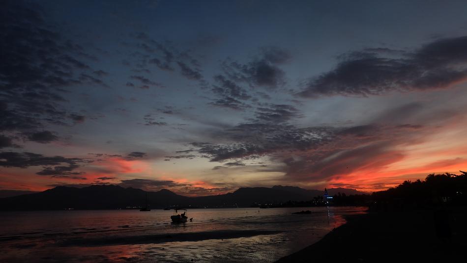 ship in sunset landscape