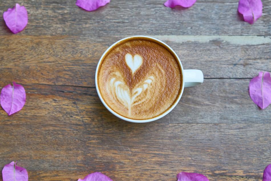 coffee on background of rose petals