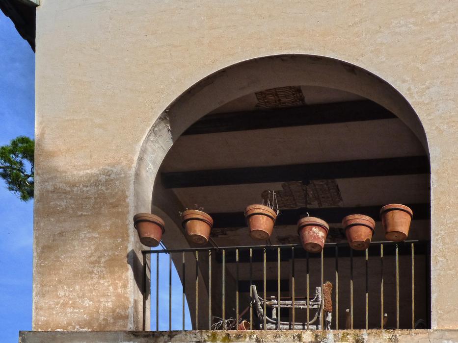 flower pots on an empty balcony