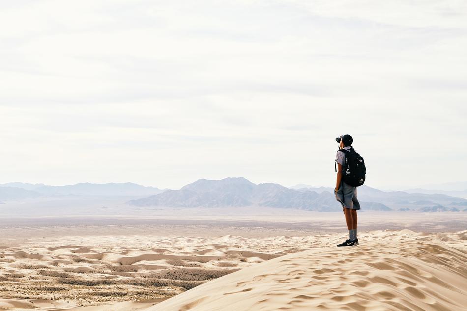 silhouette of a man on the sand