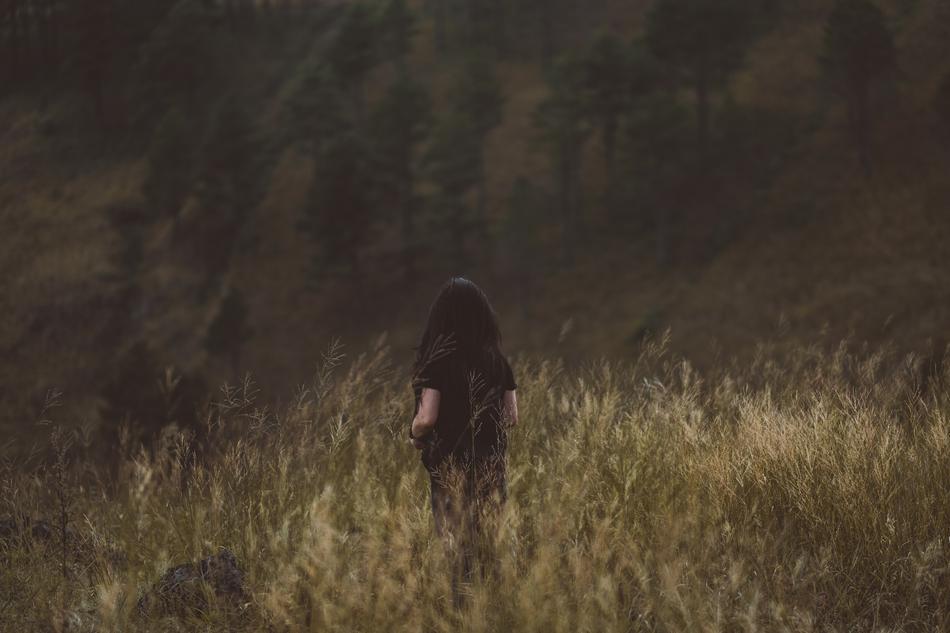 girl in a field of grass