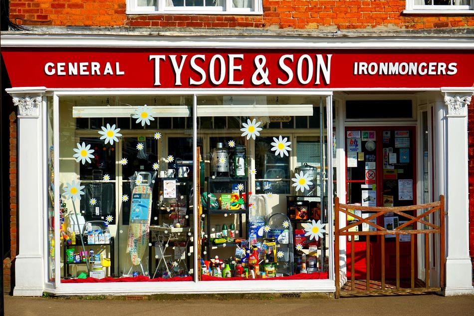 Colorful 'Tysoe and Son' shop with signs
