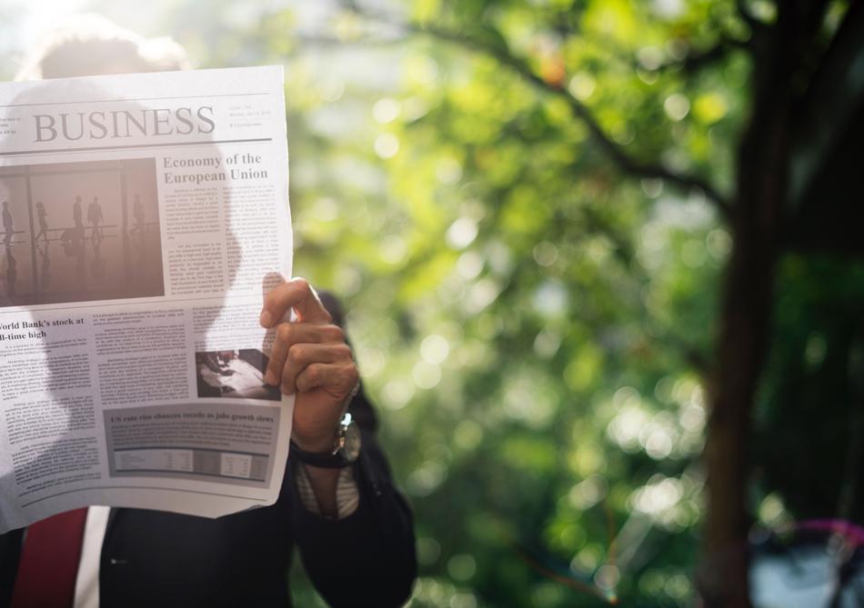 Businessman Hand newspaper