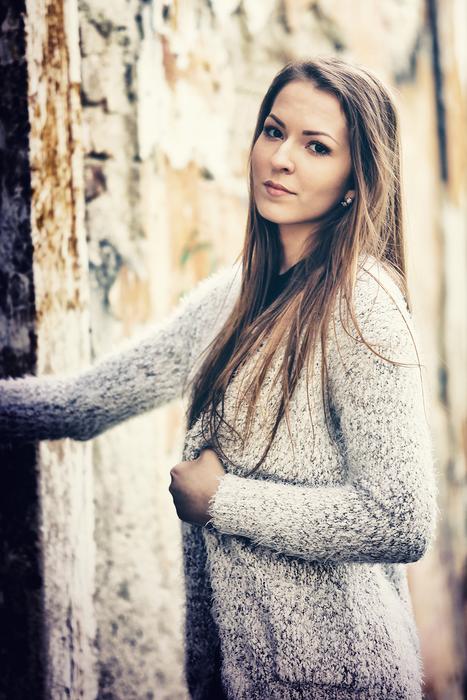 photo of a girl at the entrance to the old building