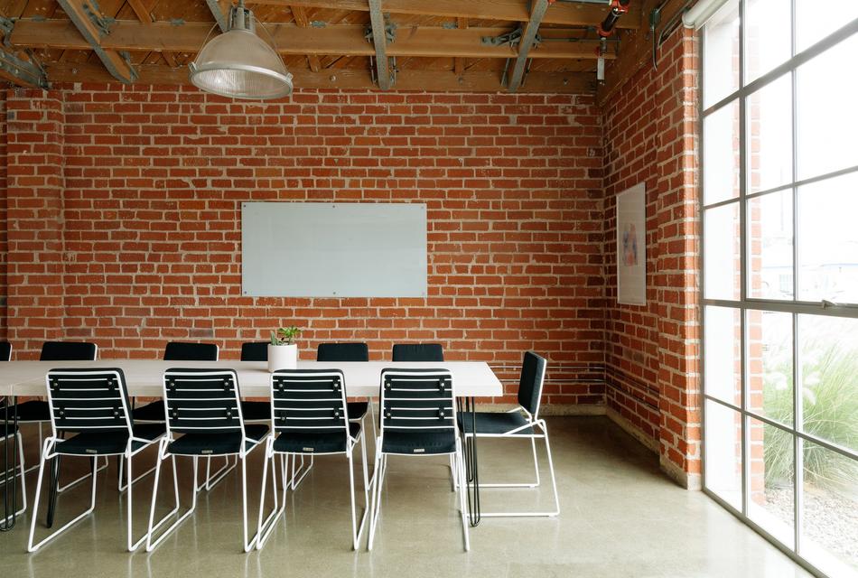 Chairs Table by brick Wall
