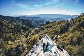 Guy legs mountains