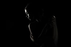 sensual girl posing in the dark