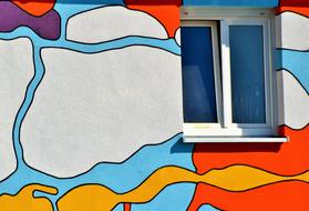 window and colorful facade of the house