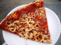Cheesy slice of pizza