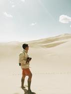 photo of a young man in the desert