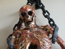 skeleton meat iron prison