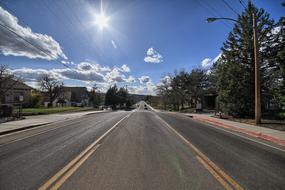 the road illuminated by the sun