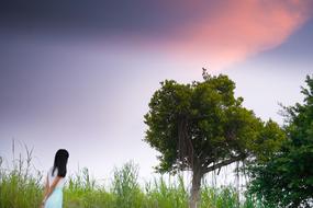 girl walking at summer evening