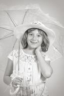 pretty child Girl beneath umbrella