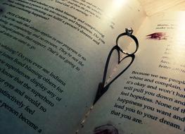 ring silhouette heart book