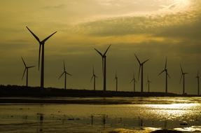 Wind Turbine On Sunset