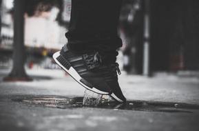 jump in a puddle on a blurred background