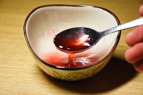 Strawberry syrup in a mug