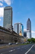 Cityscape of Frankfurt, Hesse, Germany, with buildings, under the blue sky with clouds