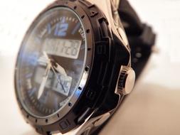 contemporary menâs Wristwatch clockface close up