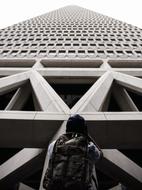 grey Building and man