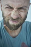 Portrait of the man with the beard, in t-shirt