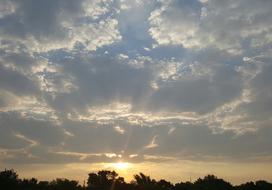 sunrise in a cloudy sky