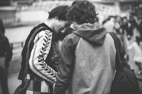 black and white photo of People on street