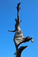 a magnificent sculpture in the blue sky