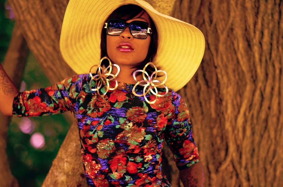 Photo of woman in hat and sunglasses