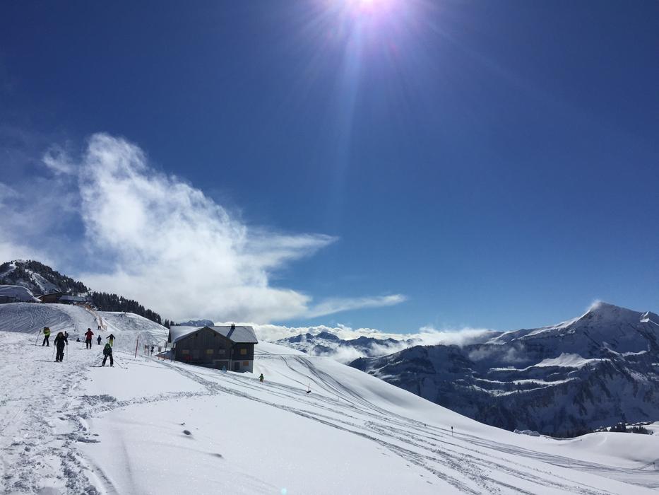 snowy mountains with the sun