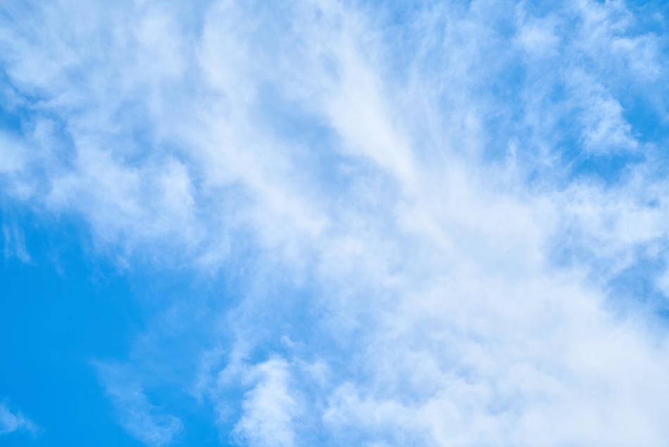 white clouds on a blue sky background