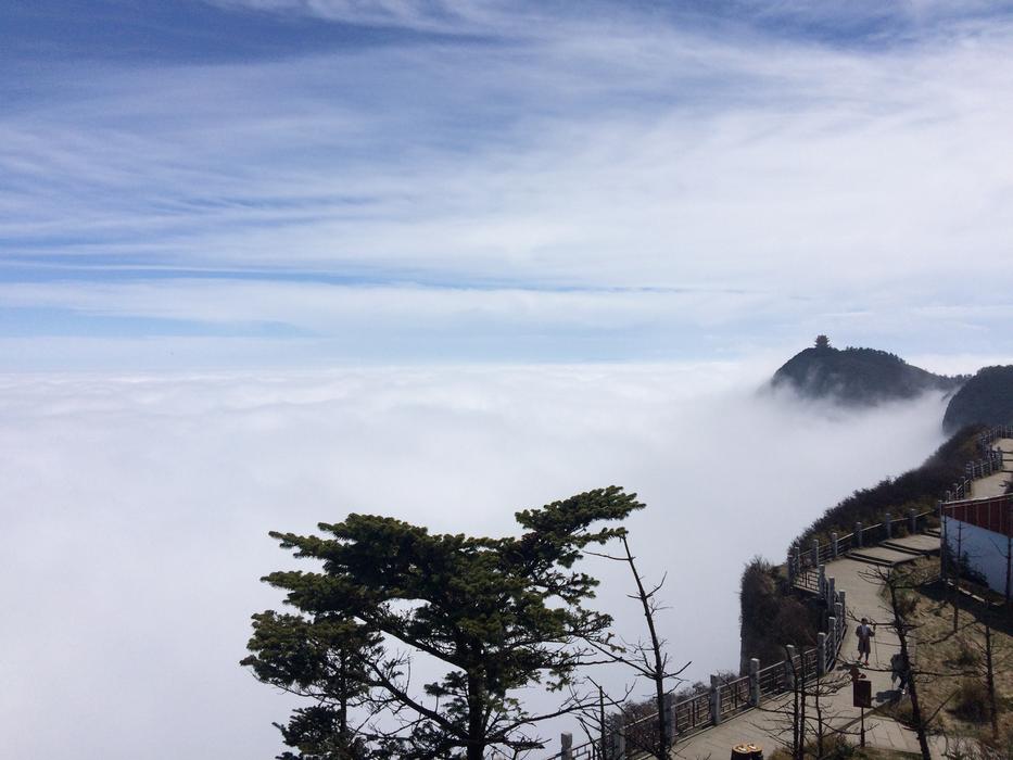 Mountain peak raise the Clouds