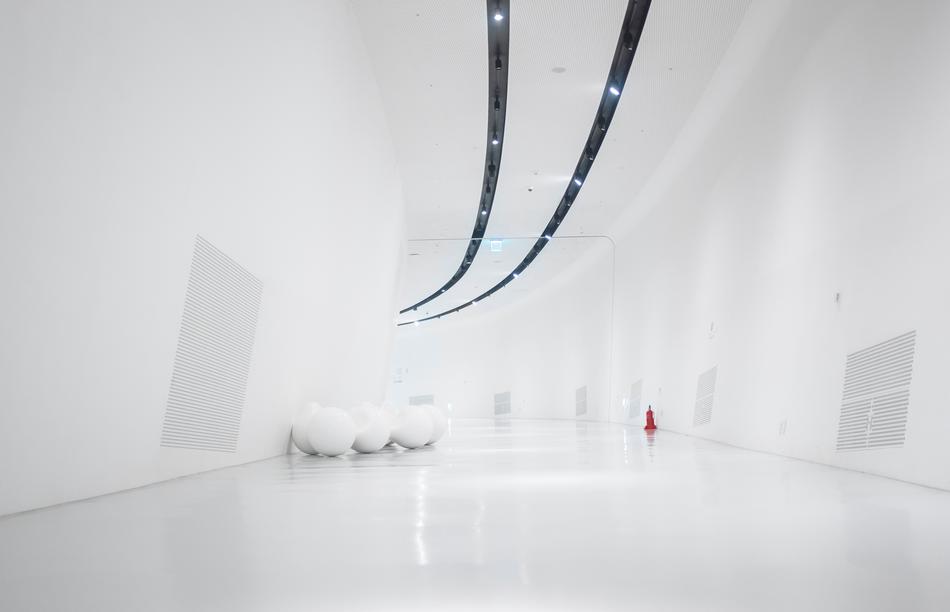 white interior with two rows of lights on ceiling